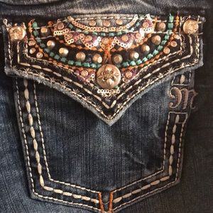 Miss Me size 27 boot cut jeans.
